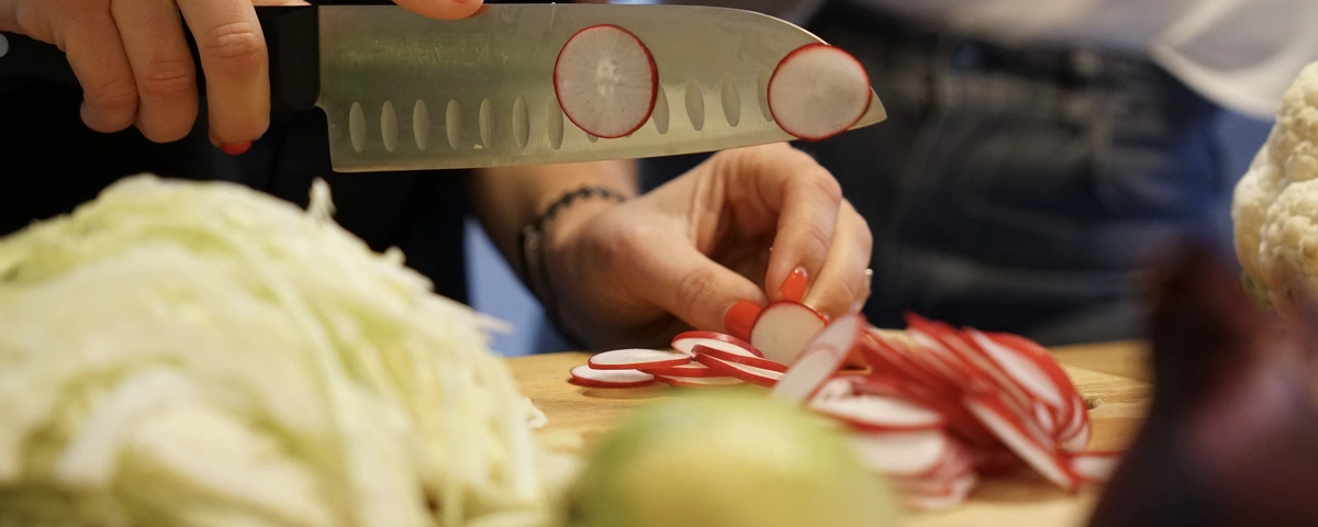 Food in Mallorca - Locally-sourced vegetables being sliced 